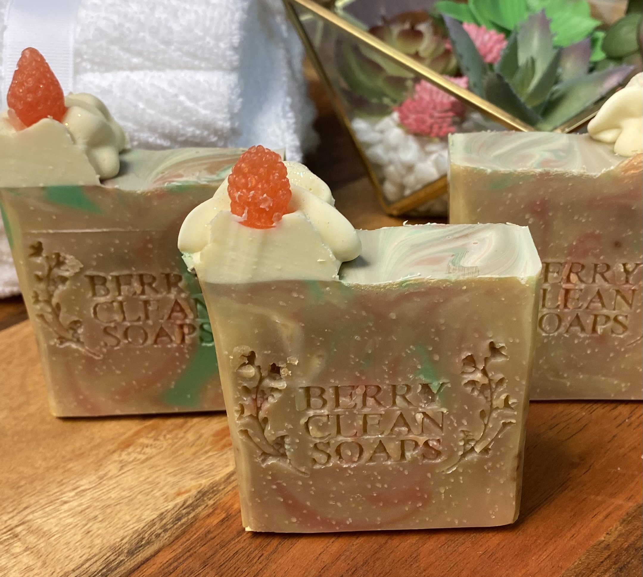 A vibrant bar of Caribbean soap featuring coconut and pineapple scents, handcrafted with natural ingredients and colorful fruit shapes.