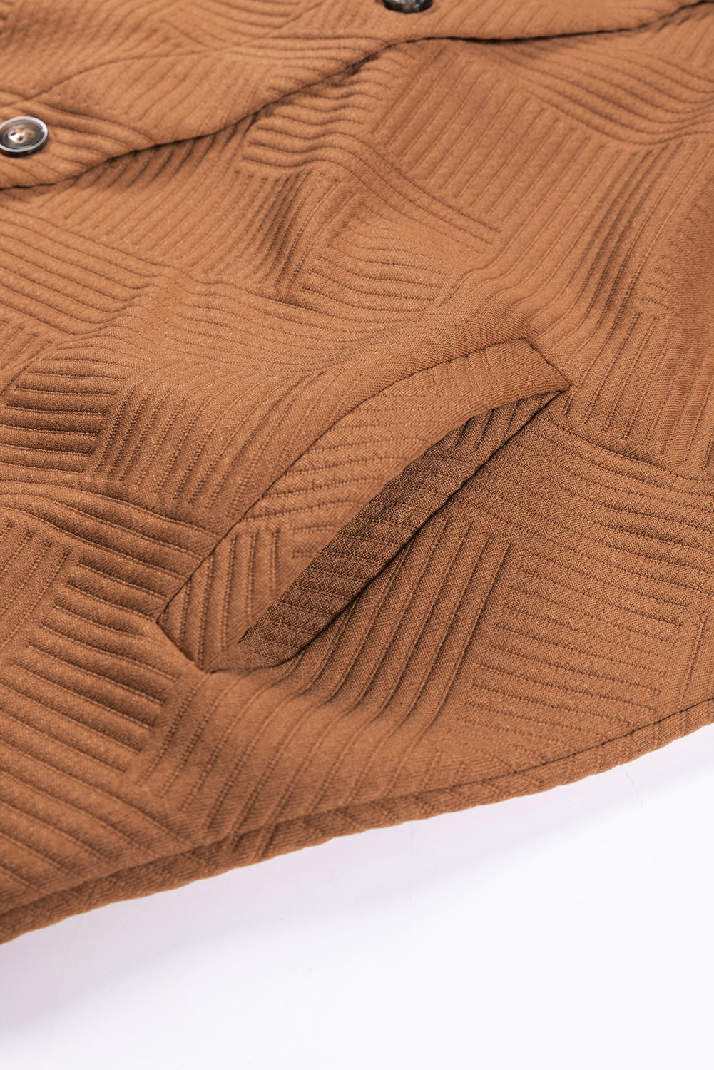 Chestnut solid color textured midi shacket with chest pockets, showcasing its stylish design and unique texture.