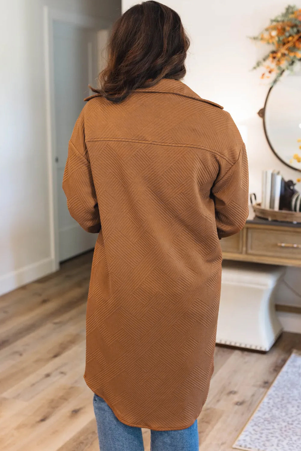 Chestnut solid color textured midi shacket with chest pockets, showcasing its stylish design and unique texture.