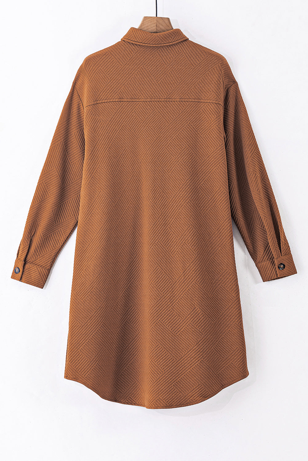 Chestnut solid color textured midi shacket with chest pockets, showcasing its stylish design and unique texture.