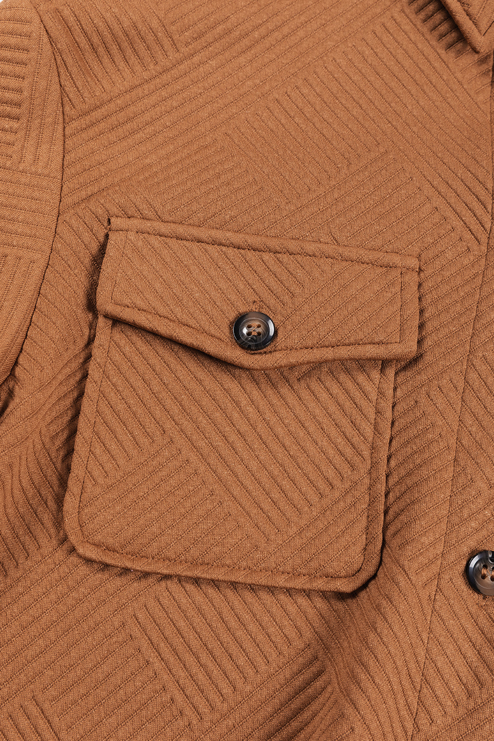 Chestnut solid color textured midi shacket with chest pockets, showcasing its stylish design and unique texture.