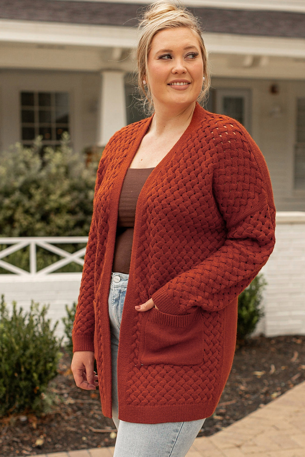 Chestnut Weave Knit Plus Size Cardigan with side pockets, showcasing a stylish design suitable for various outfits.