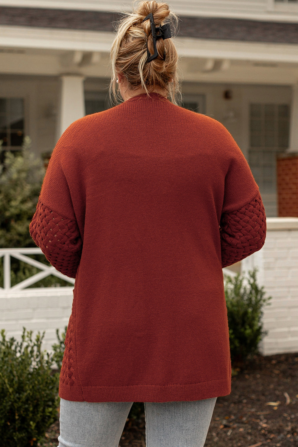 Chestnut Weave Knit Plus Size Cardigan with side pockets, showcasing a stylish design suitable for various outfits.