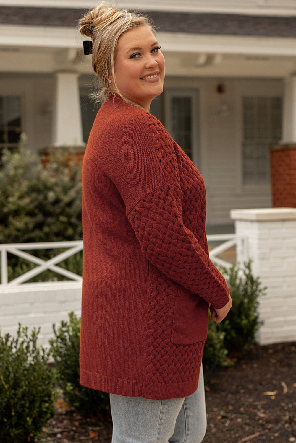 Chestnut Weave Knit Plus Size Cardigan with side pockets, showcasing a stylish design suitable for various outfits.