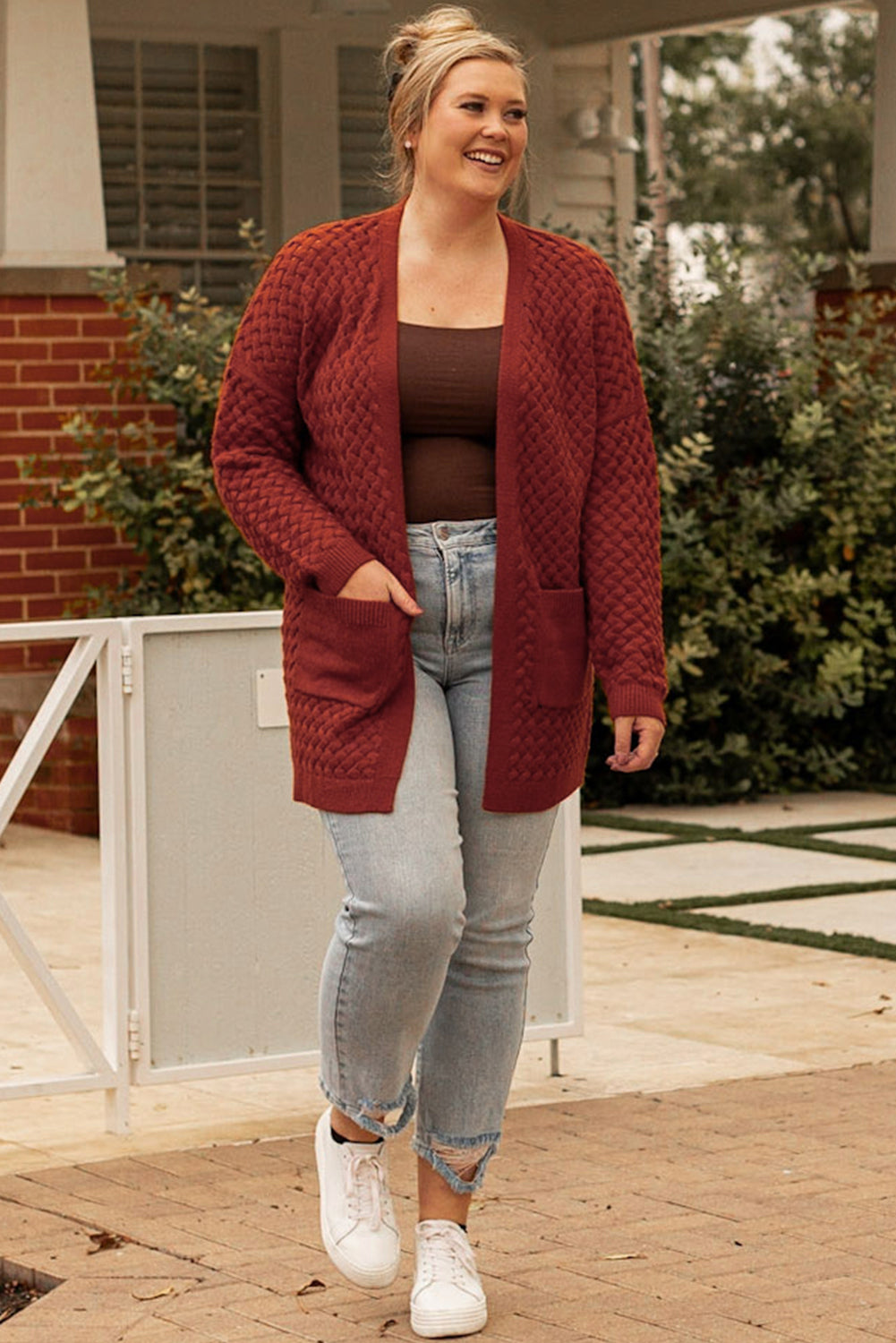 Chestnut Weave Knit Plus Size Cardigan with side pockets, showcasing a stylish design suitable for various outfits.