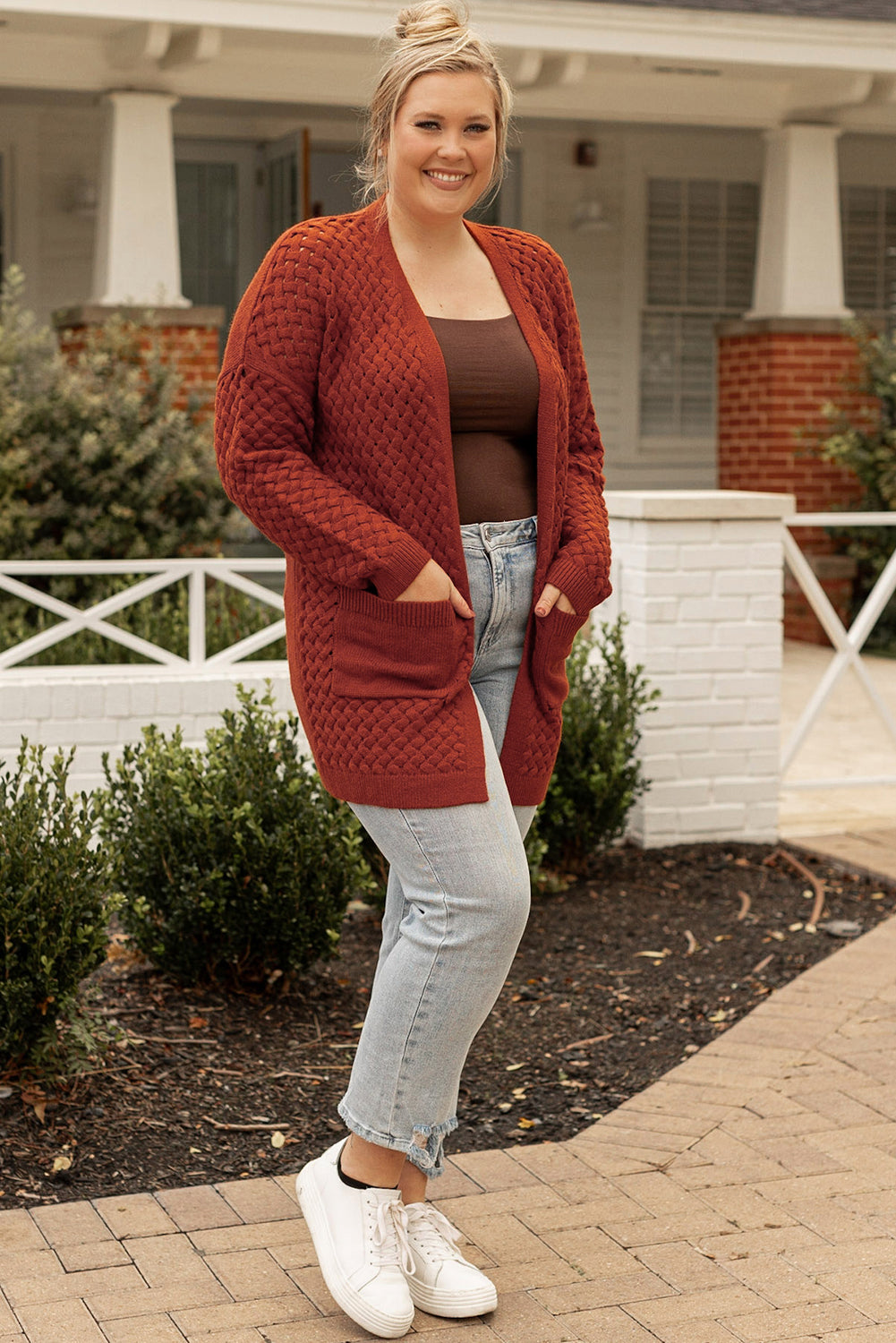 Chestnut Weave Knit Plus Size Cardigan with side pockets, showcasing a stylish design suitable for various outfits.