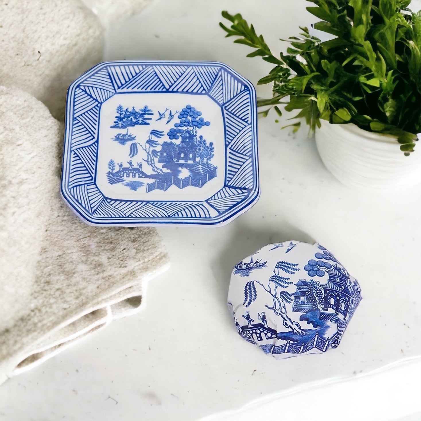 Chinoiserie Soap & Dish Set featuring a sandalwood scented soap on a blue and white porcelain tray, elegantly embossed design.