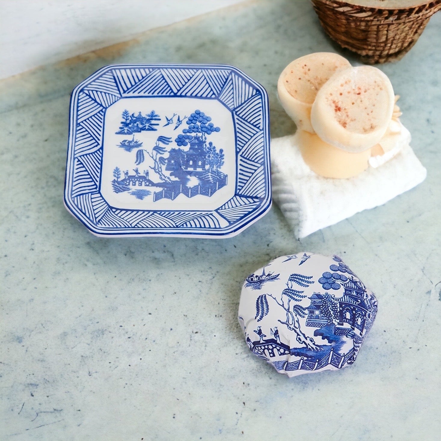 Chinoiserie Soap & Dish Set featuring a sandalwood scented soap on a blue and white porcelain tray, elegantly embossed design.