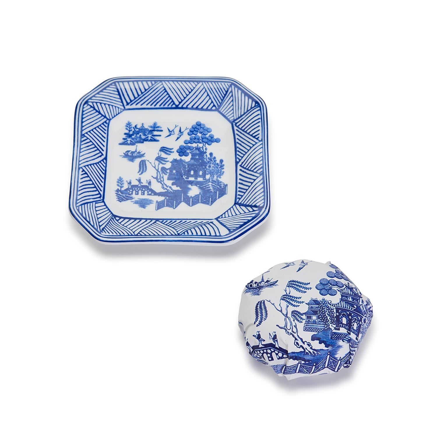 Chinoiserie Soap & Dish Set featuring a sandalwood scented soap on a blue and white porcelain tray, elegantly embossed design.