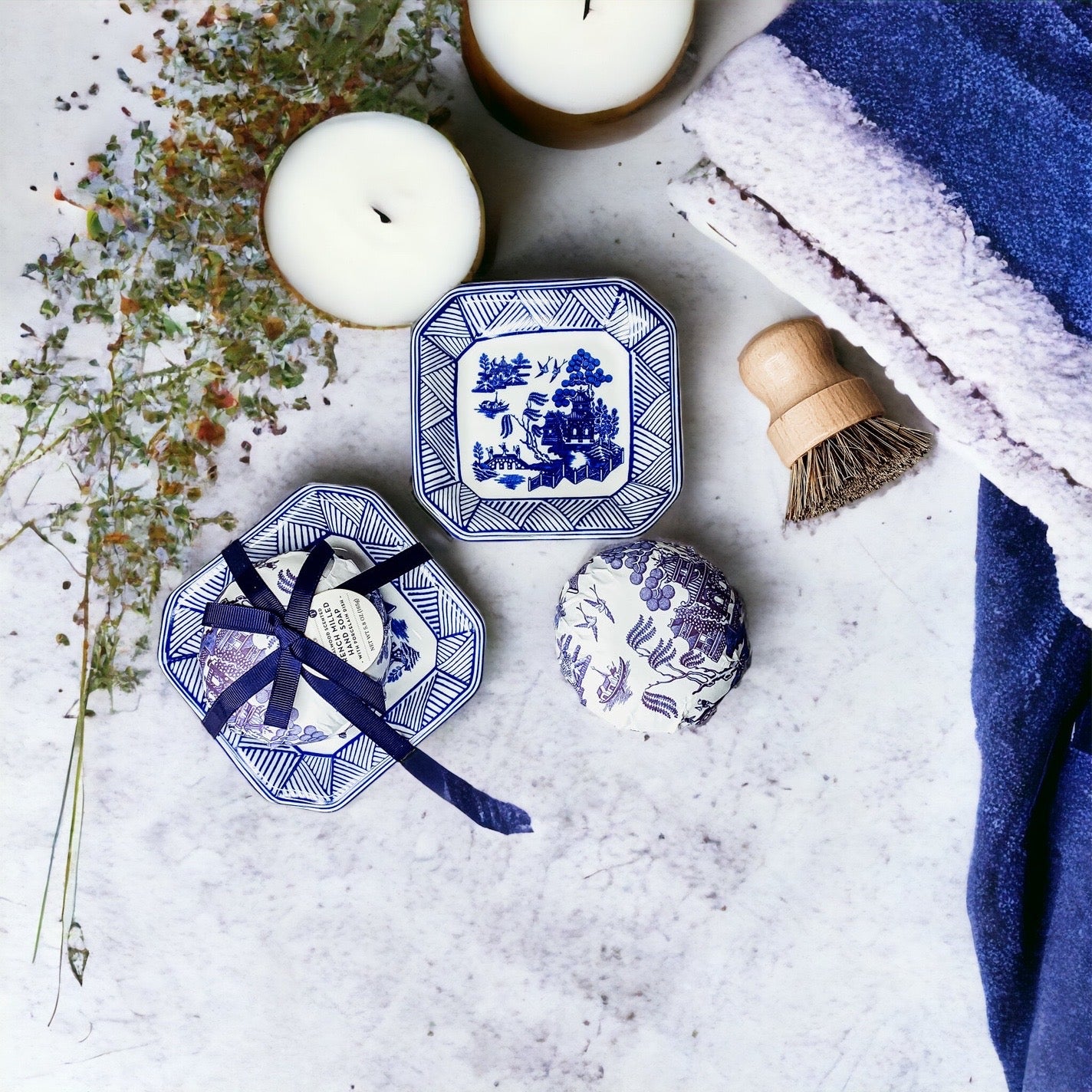 Chinoiserie Soap & Dish Set featuring a sandalwood scented soap on a blue and white porcelain tray, elegantly embossed design.