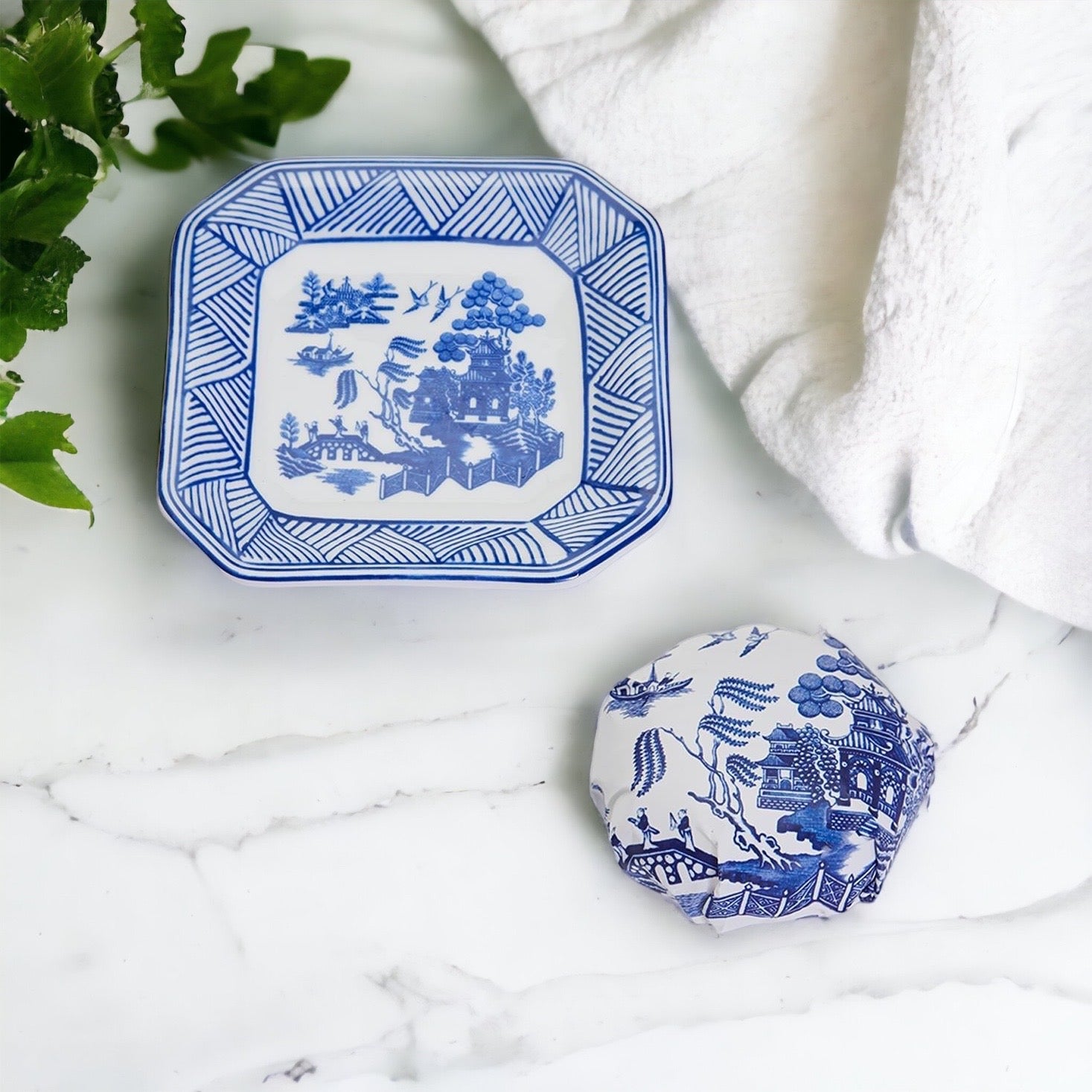 Chinoiserie Soap & Dish Set featuring a sandalwood scented soap on a blue and white porcelain tray, elegantly embossed design.