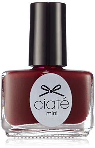 Ciaté The Paint Pot Nail Polish in Dangerous Affair, showcasing a deep red color in a sleek bottle.