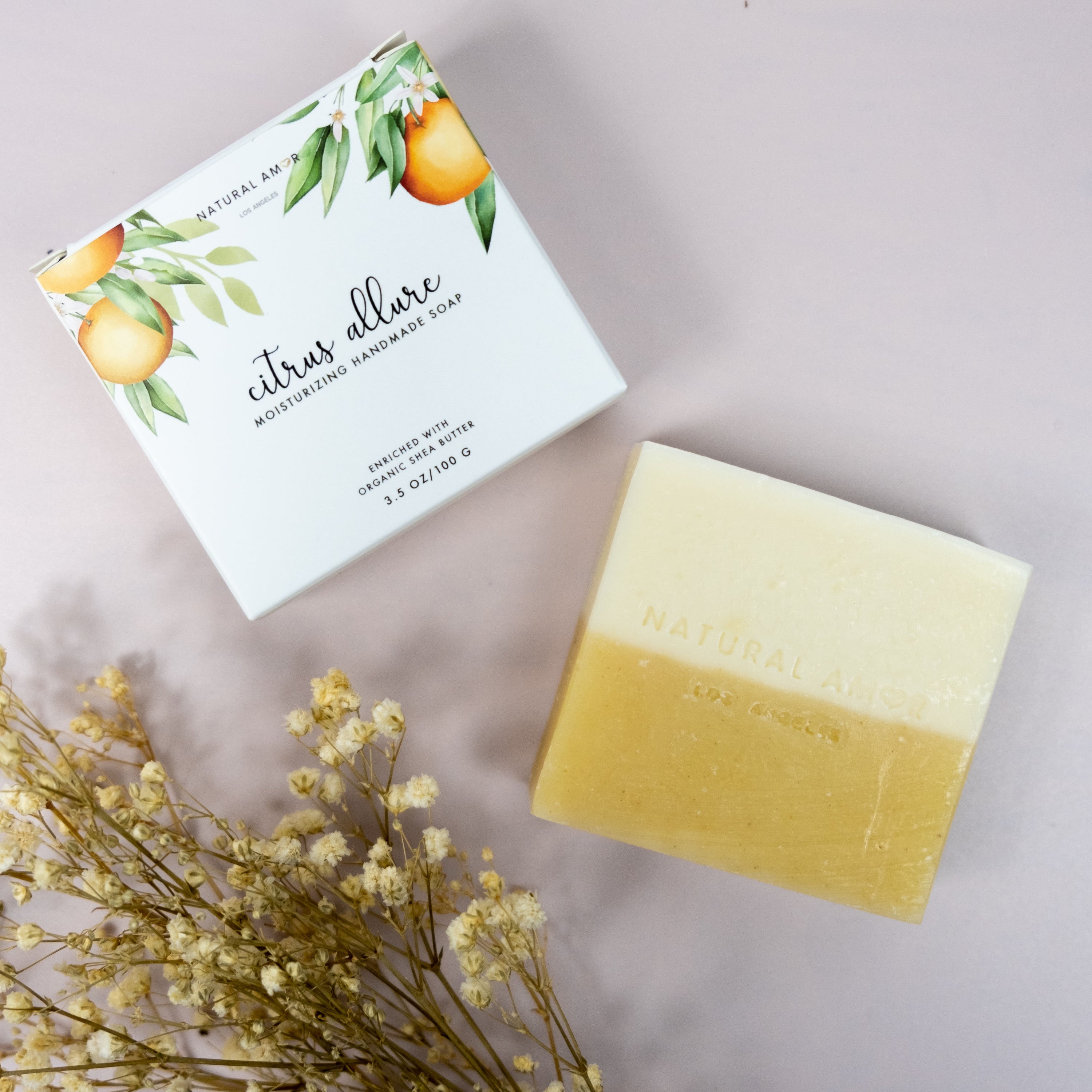 Citrus Allure Soap Bar 3.5oz in a beautifully designed paper box, showcasing its vibrant colors and natural ingredients.