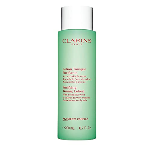 Bottle of Clarins Purifying Toning Face Lotion with a sleek design, showcasing its refreshing formula for oily and combination skin.