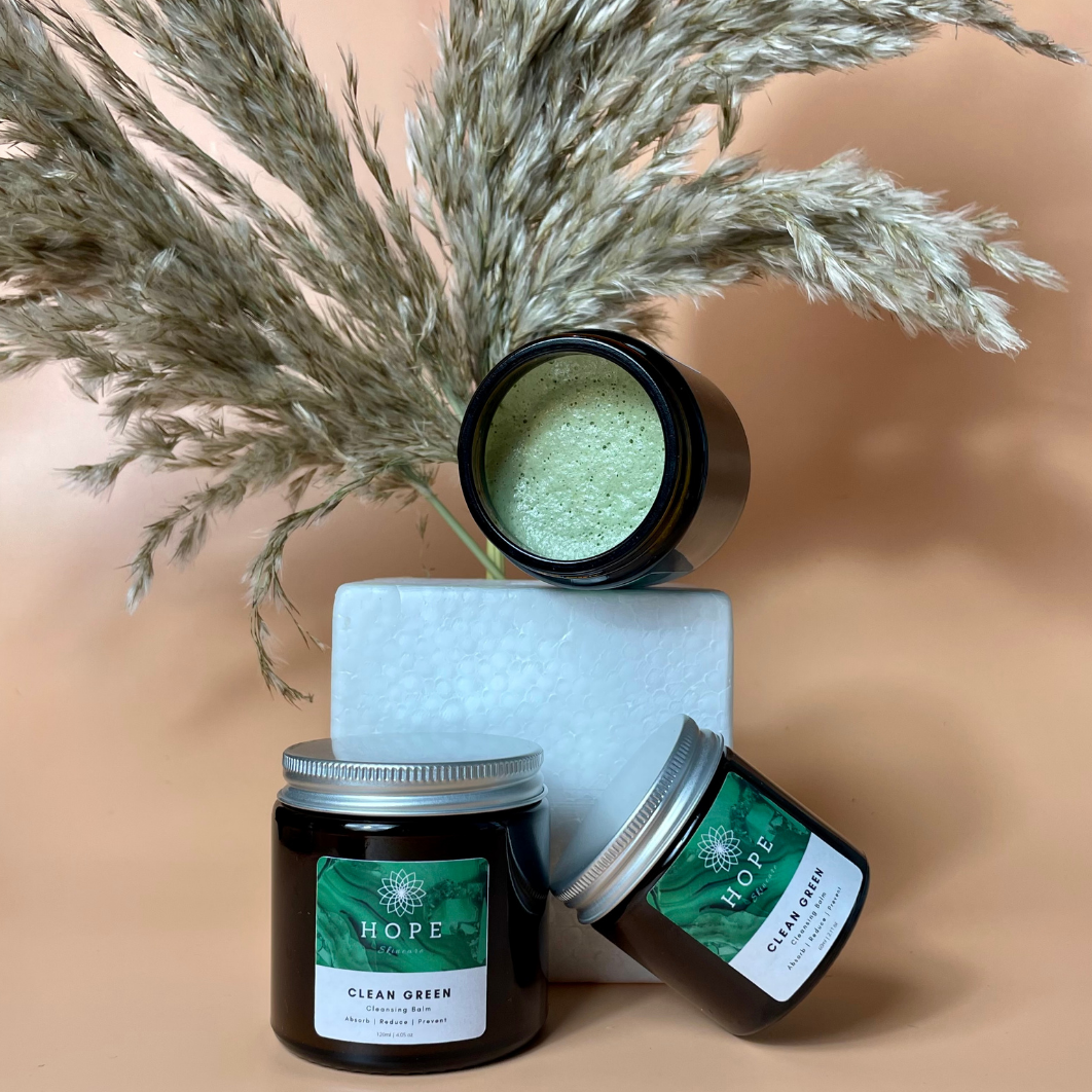 Clean Green Cleansing Balm in a sleek jar, showcasing its rich, creamy texture and eco-friendly packaging.