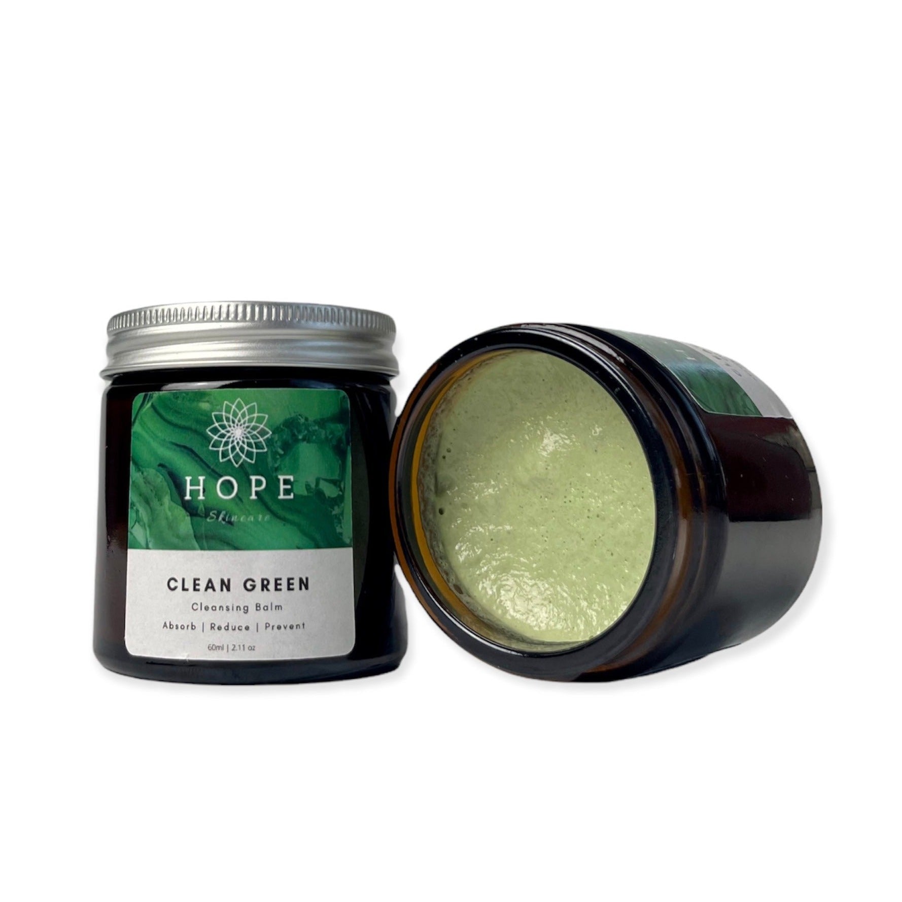 Clean Green Cleansing Balm in a sleek jar, showcasing its rich, creamy texture and eco-friendly packaging.