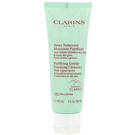 Clarins Cleanser Purifying Gentle Cleaning Foam in a sleek bottle with a foaming dispenser, showcasing its luxurious texture.