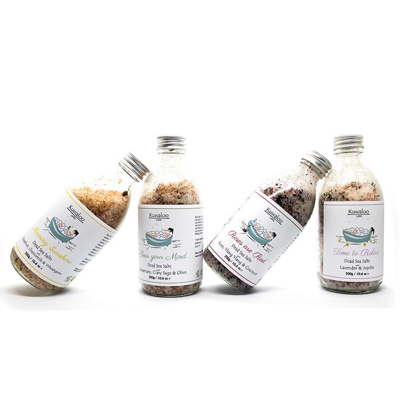 A bottle of 'Clear your Mind' Bath Salts, featuring Dead Sea minerals and essential oils for a relaxing bath experience.