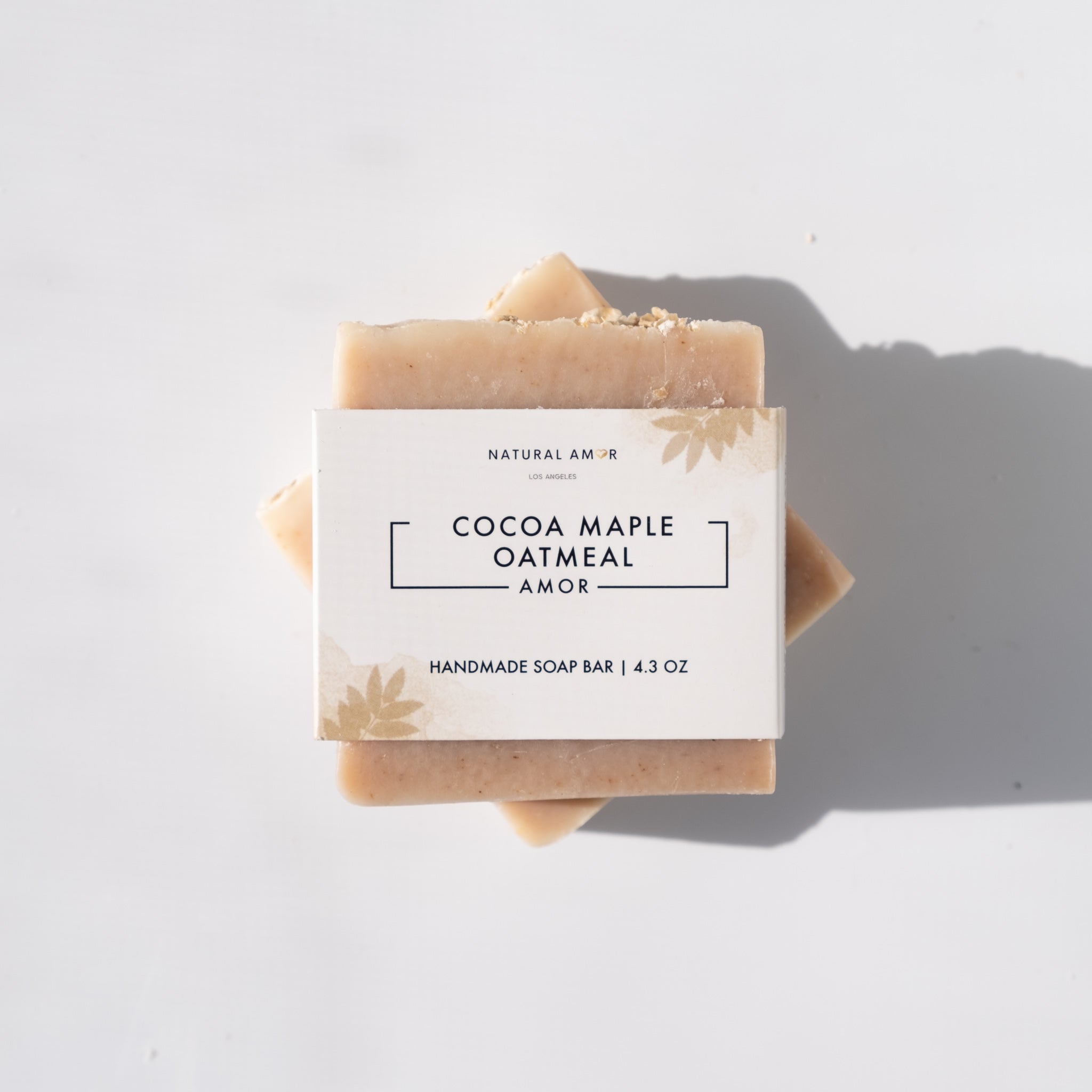 Cocoa Maple Oatmeal Soap Bar, a gentle unscented soap made with organic ingredients, featuring a rich brown color and oatmeal texture.