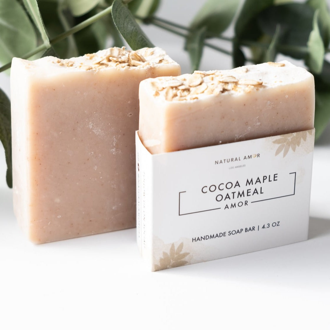 Cocoa Maple Oatmeal Soap Bar, a gentle unscented soap made with organic ingredients, featuring a rich brown color and oatmeal texture.