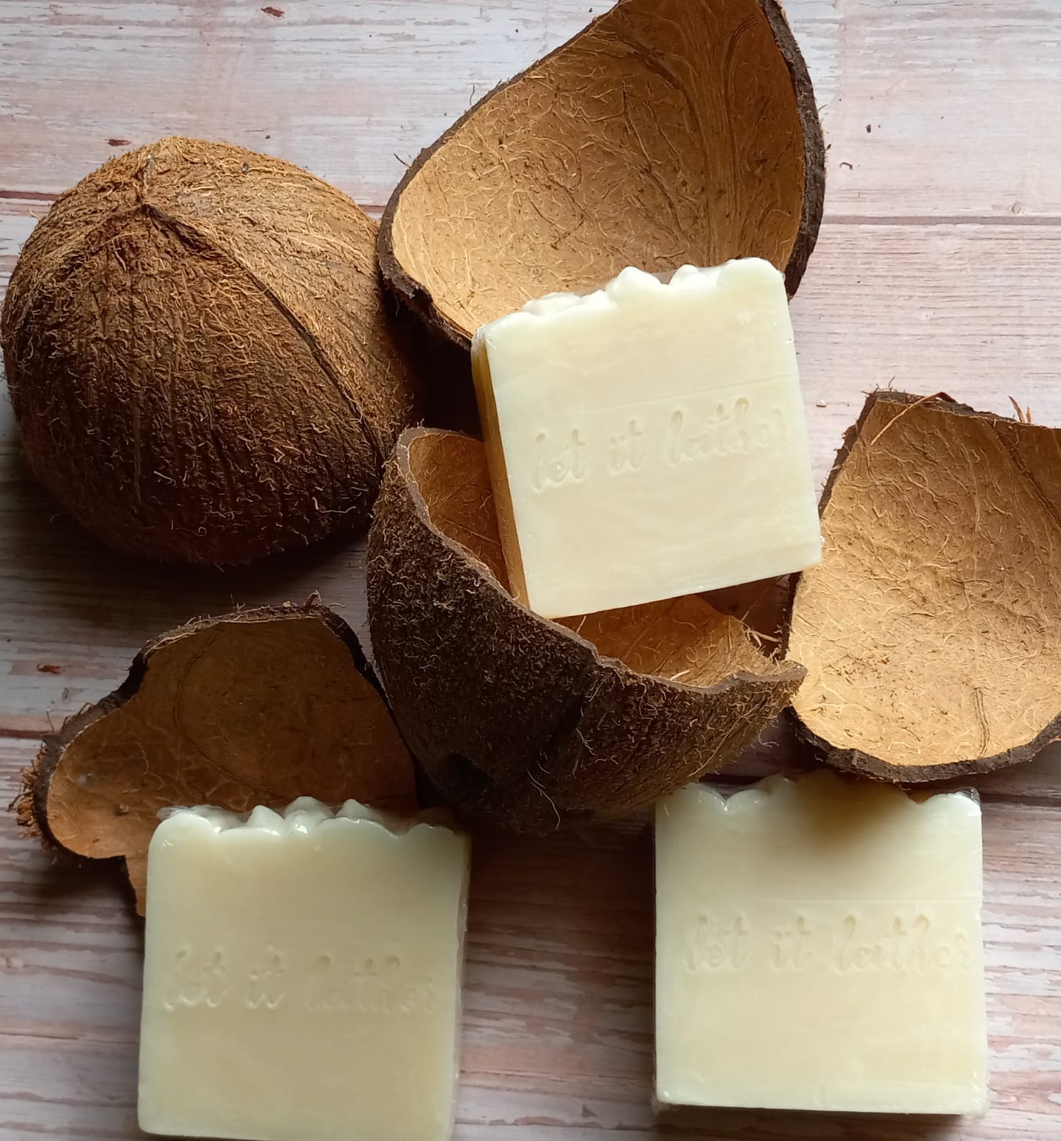 A bar of Coconut Milk Bath Soap with a creamy texture, showcasing its natural ingredients and coconut milk infusion.