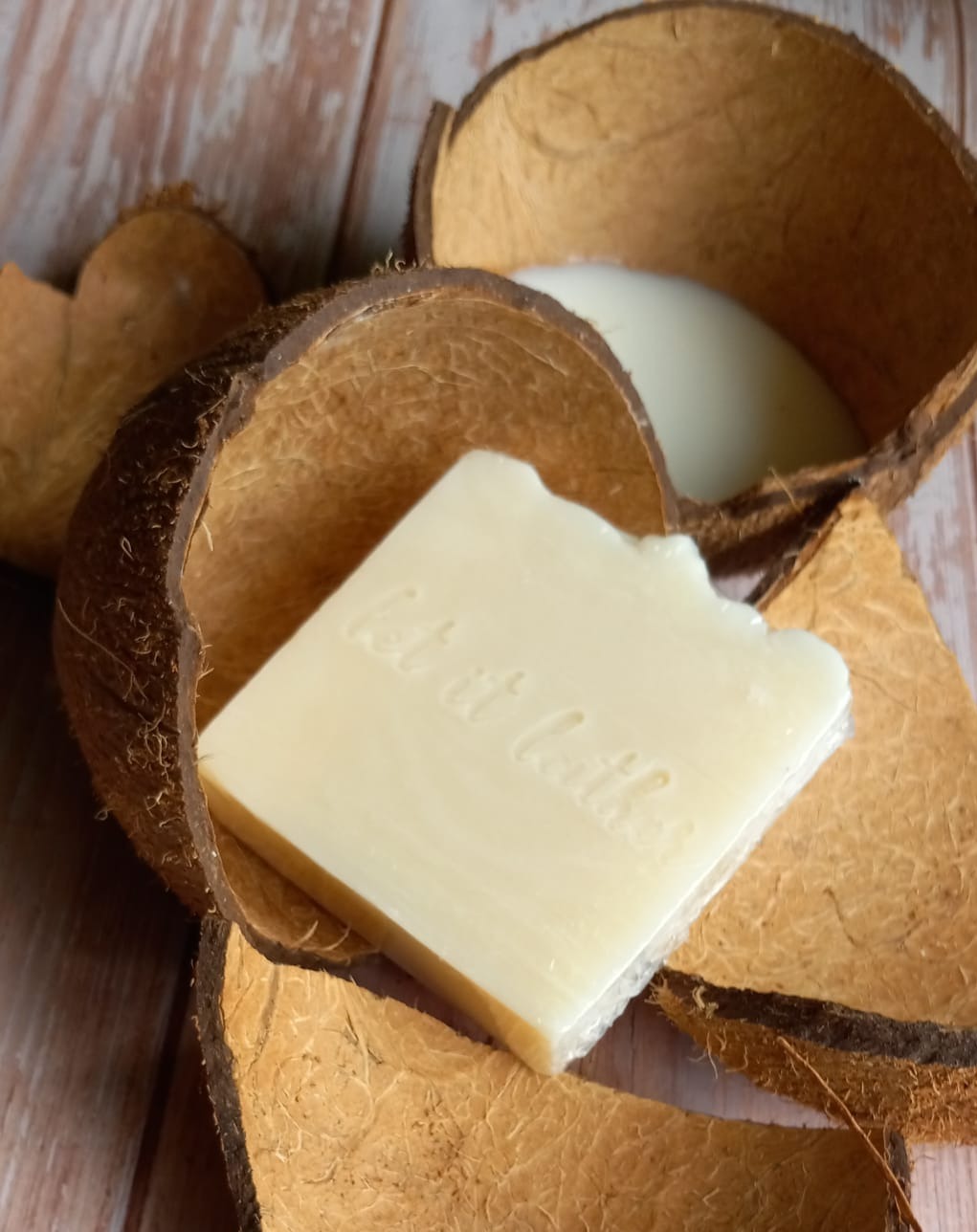 A bar of Coconut Milk Bath Soap with a creamy texture, showcasing its natural ingredients and coconut milk infusion.