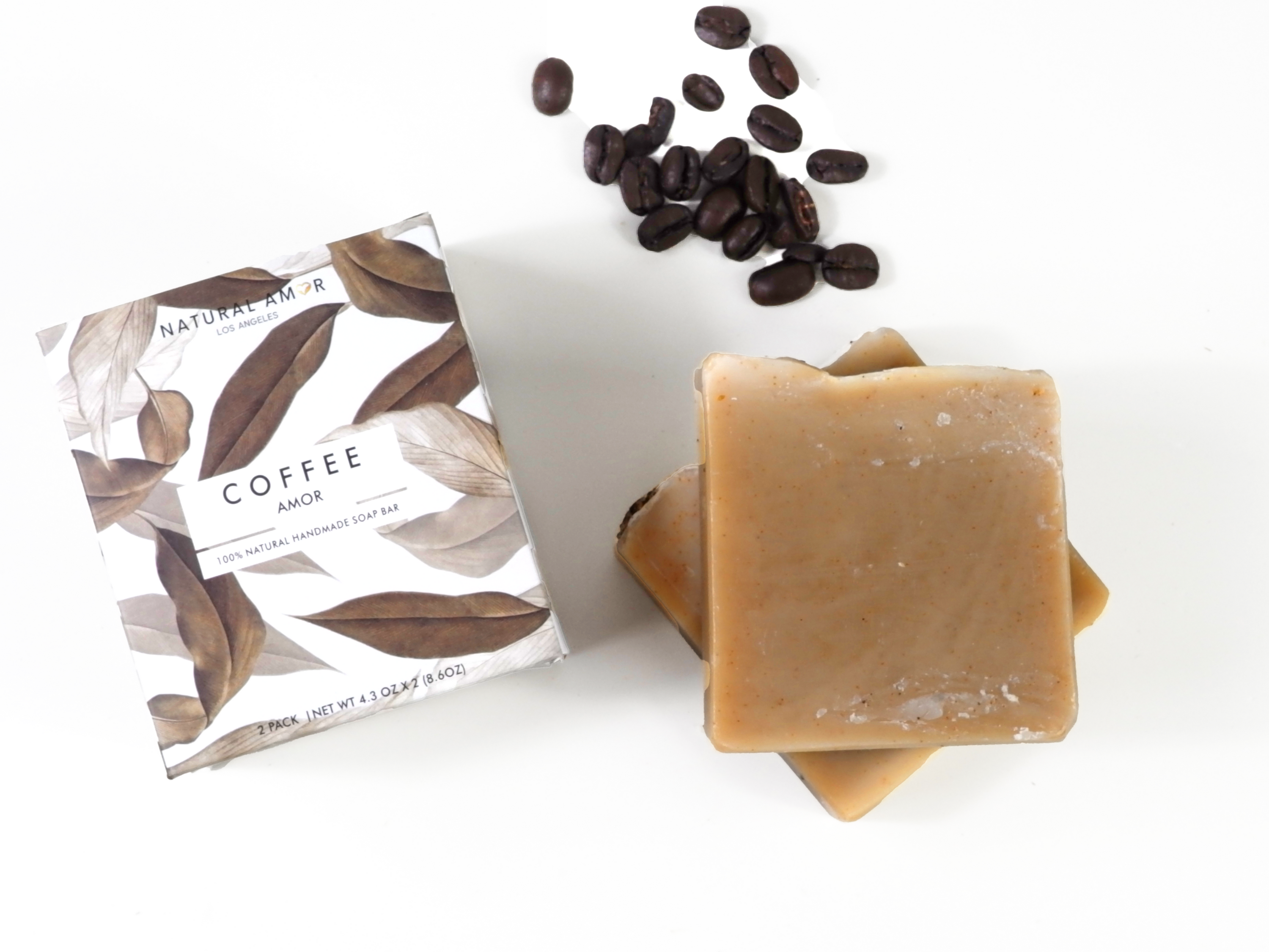 Two bars of Coffee Soap in a stylish box, showcasing natural ingredients and exfoliating walnut shells.