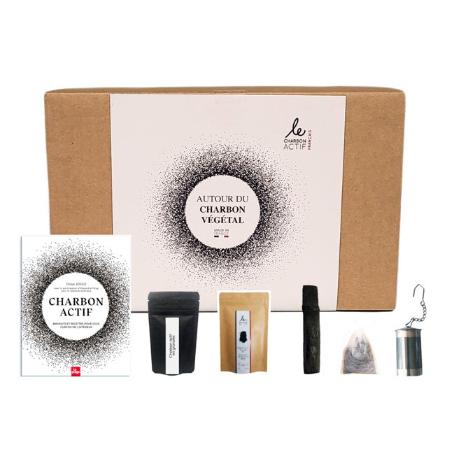 Coffret contenant divers produits à base de charbon végétal, idéal pour détoxification et purification.