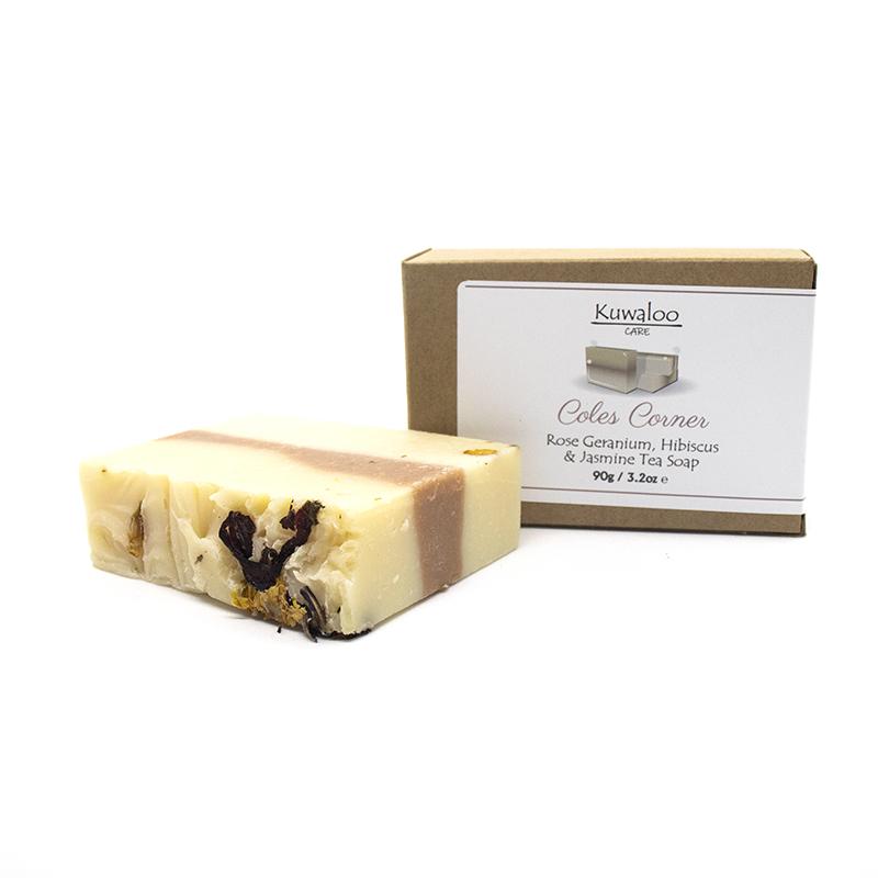 Coles Corner Organic Soap 90g featuring Rose Geranium, Hibiscus, and Jasmine with a beautiful pink hue and natural ingredients.