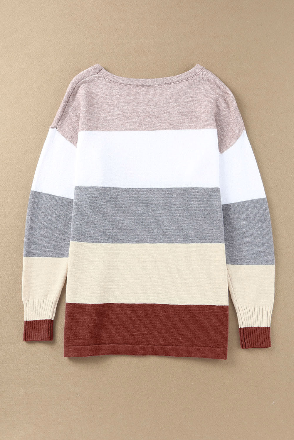 A stylish Colorblock Pocketed Sweater featuring a longline silhouette, vibrant color blocks, and convenient pockets, perfect for casual wear.