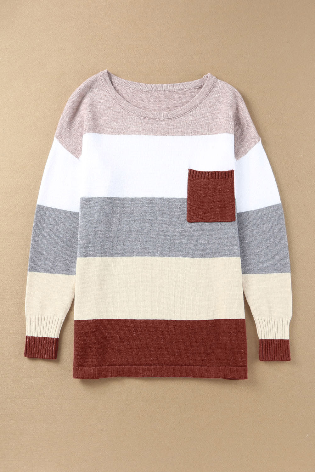 A stylish Colorblock Pocketed Sweater featuring a longline silhouette, vibrant color blocks, and convenient pockets, perfect for casual wear.