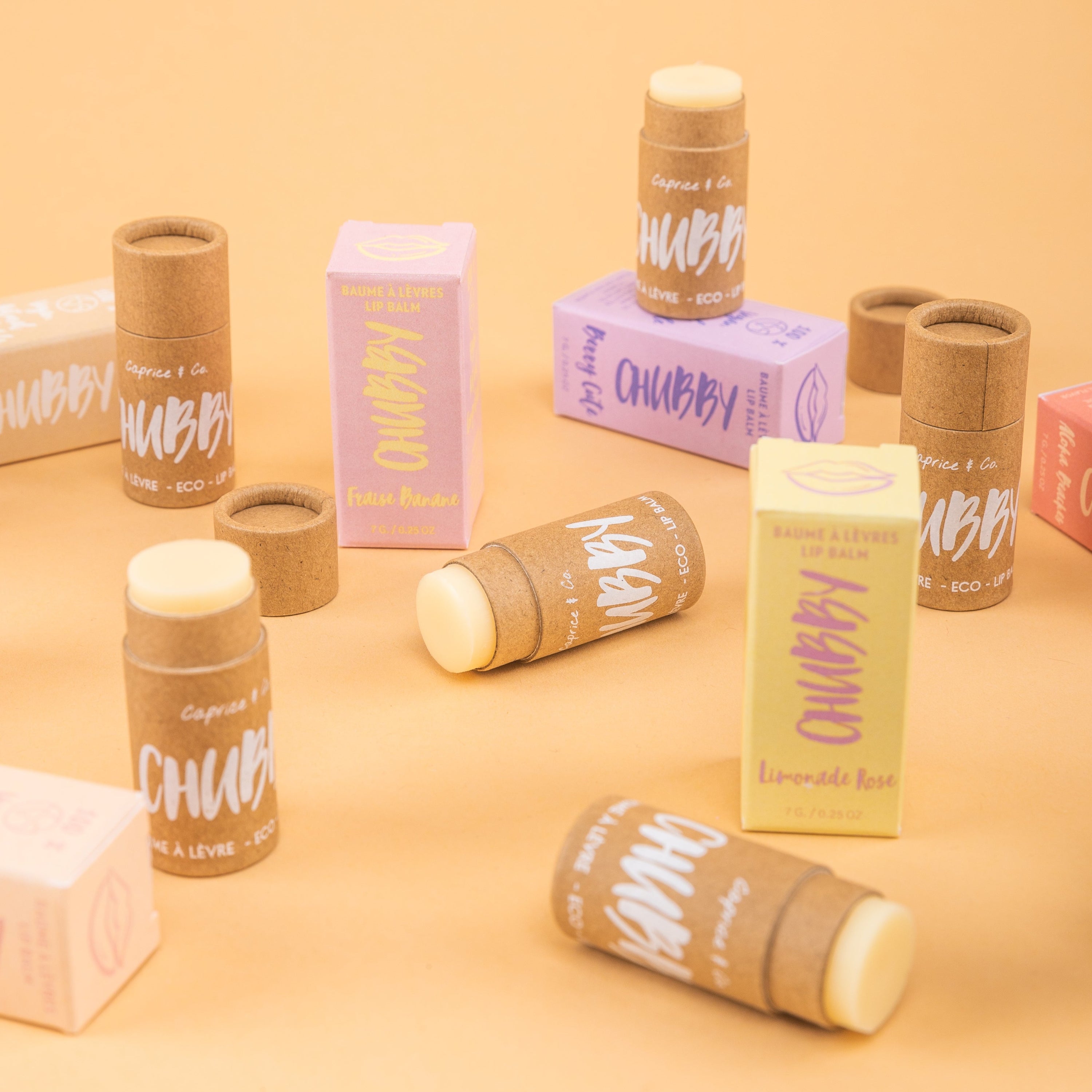 A tube of compostable vegan lip balm with a natural, eco-friendly design, showcasing its organic ingredients and biodegradable packaging.