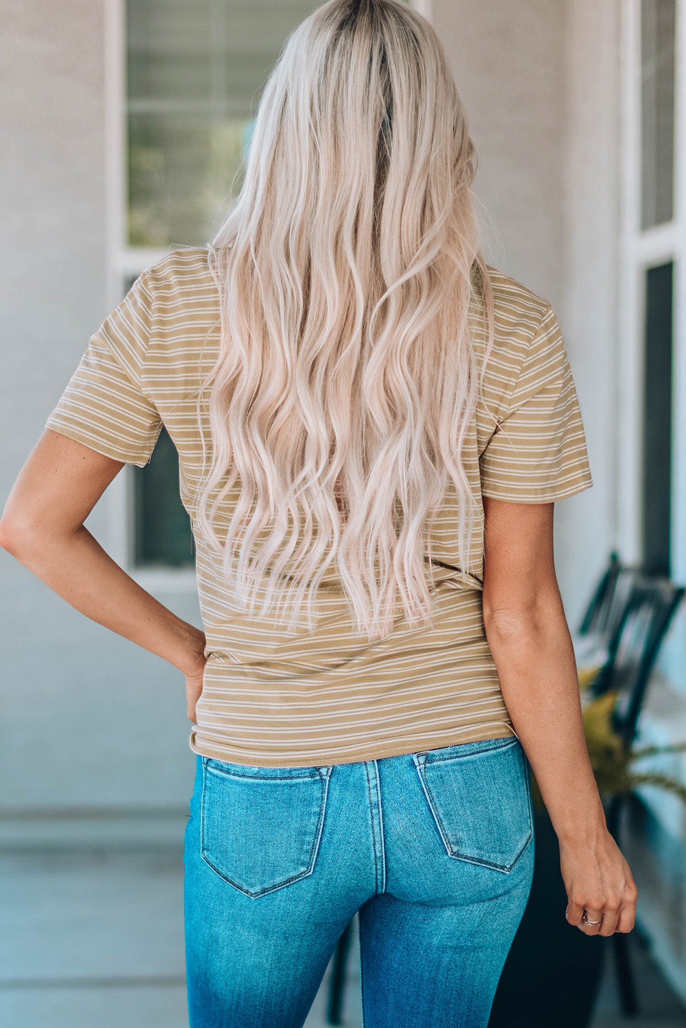 A stylish Contrast Striped Patchwork Tee featuring a round neckline, short sleeves, and a chest pocket, showcasing a vibrant color combination.