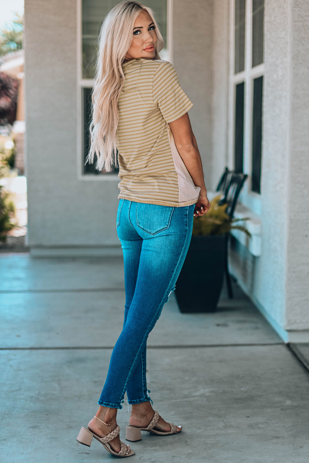 A stylish Contrast Striped Patchwork Tee featuring a round neckline, short sleeves, and a chest pocket, showcasing a vibrant color combination.