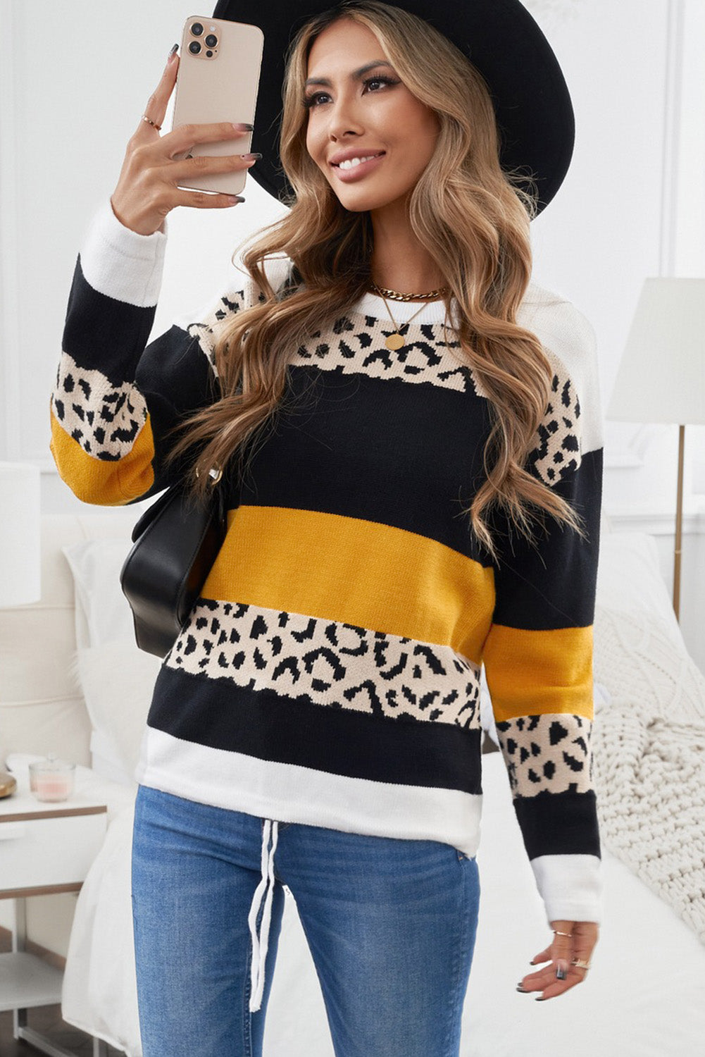 A stylish Crewneck Leopard Color Block Knit Pullover Sweater featuring a chic color block design and leopard pattern splicing, perfect for casual wear.