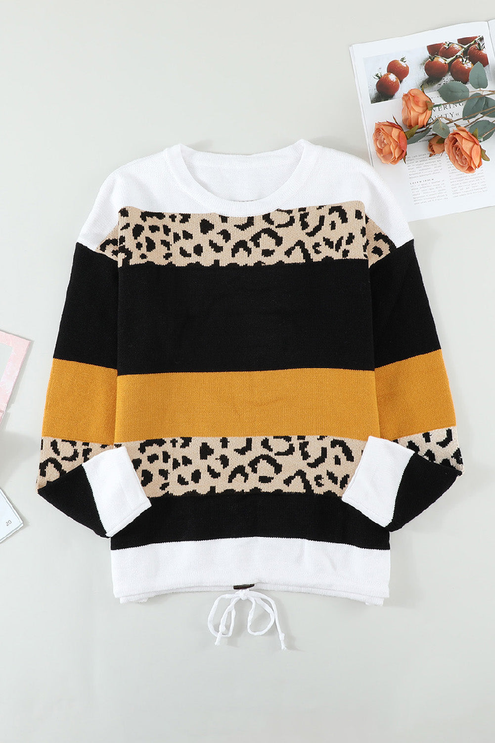 A stylish Crewneck Leopard Color Block Knit Pullover Sweater featuring a chic color block design and leopard pattern splicing, perfect for casual wear.