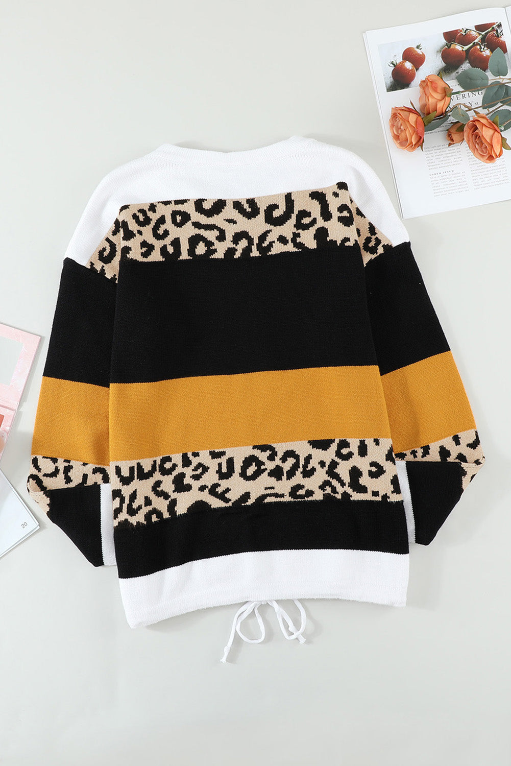 A stylish Crewneck Leopard Color Block Knit Pullover Sweater featuring a chic color block design and leopard pattern splicing, perfect for casual wear.