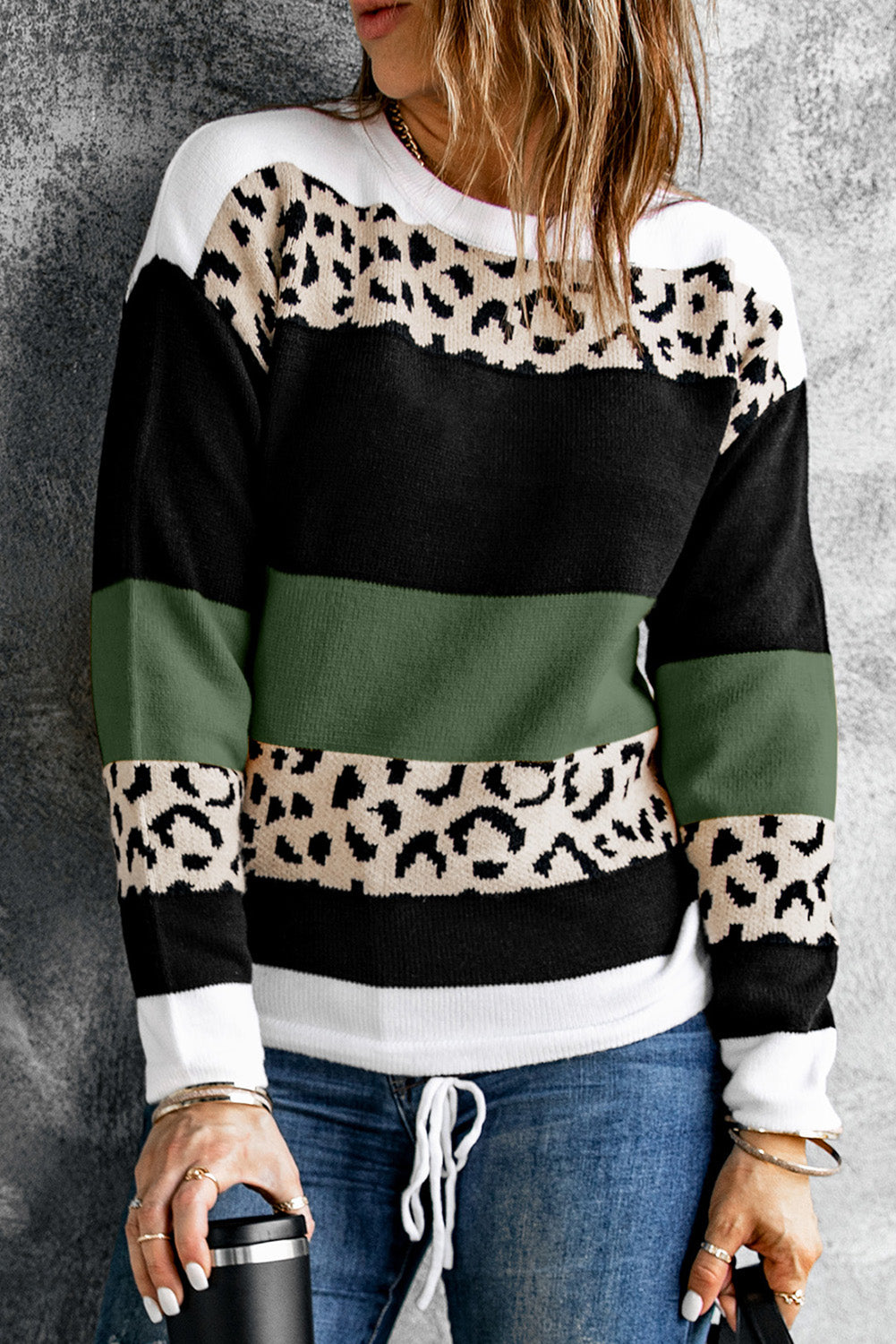 A stylish Crewneck Leopard Color Block Knit Pullover Sweater featuring a chic color block design and leopard pattern splicing, perfect for casual wear.