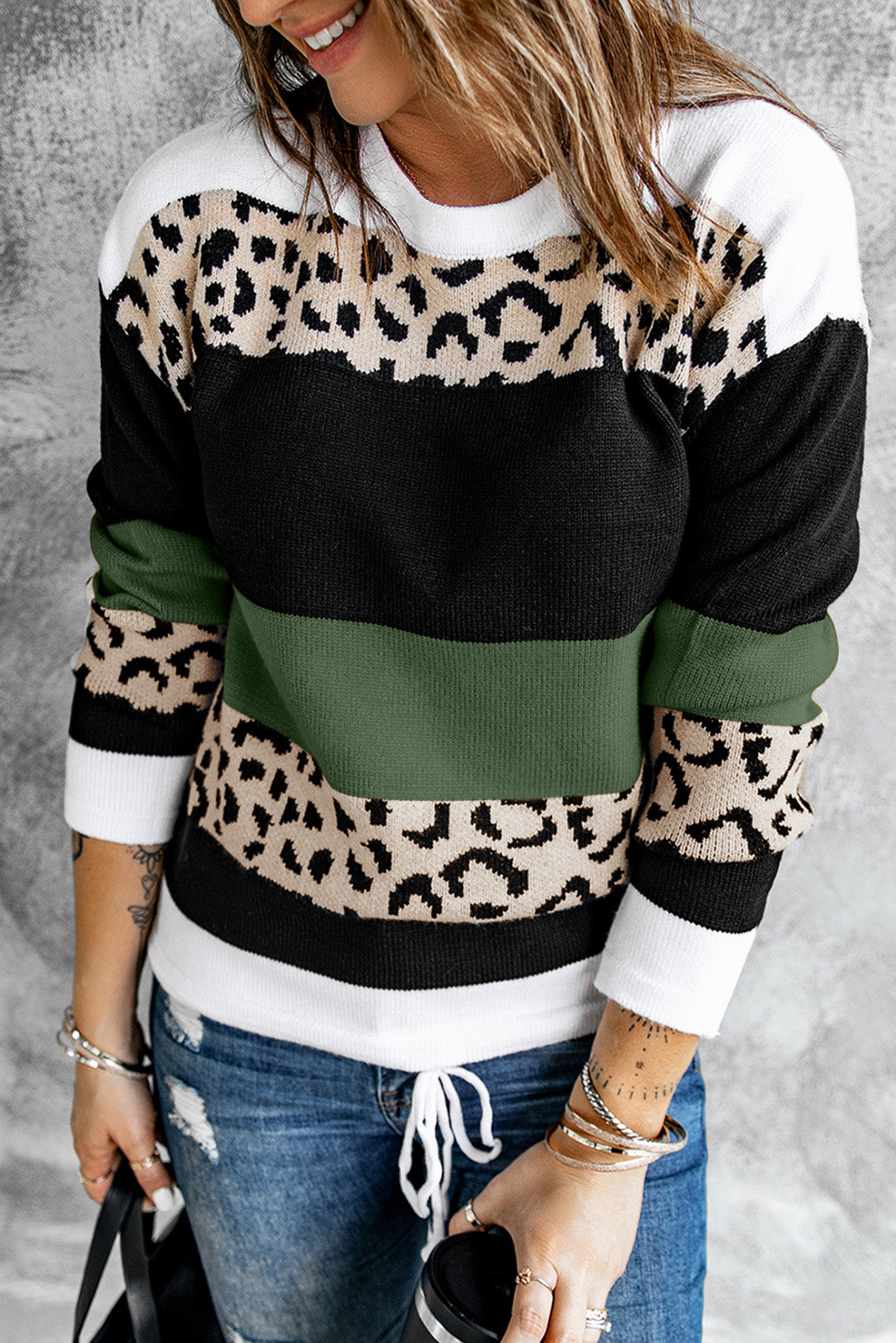 A stylish Crewneck Leopard Color Block Knit Pullover Sweater featuring a chic color block design and leopard pattern splicing, perfect for casual wear.