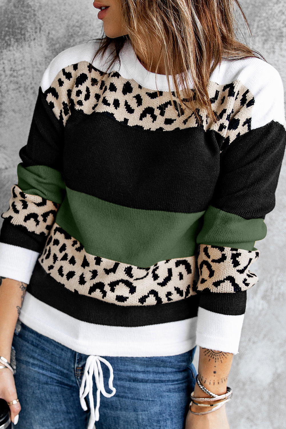 A stylish Crewneck Leopard Color Block Knit Pullover Sweater featuring a chic color block design and leopard pattern splicing, perfect for casual wear.