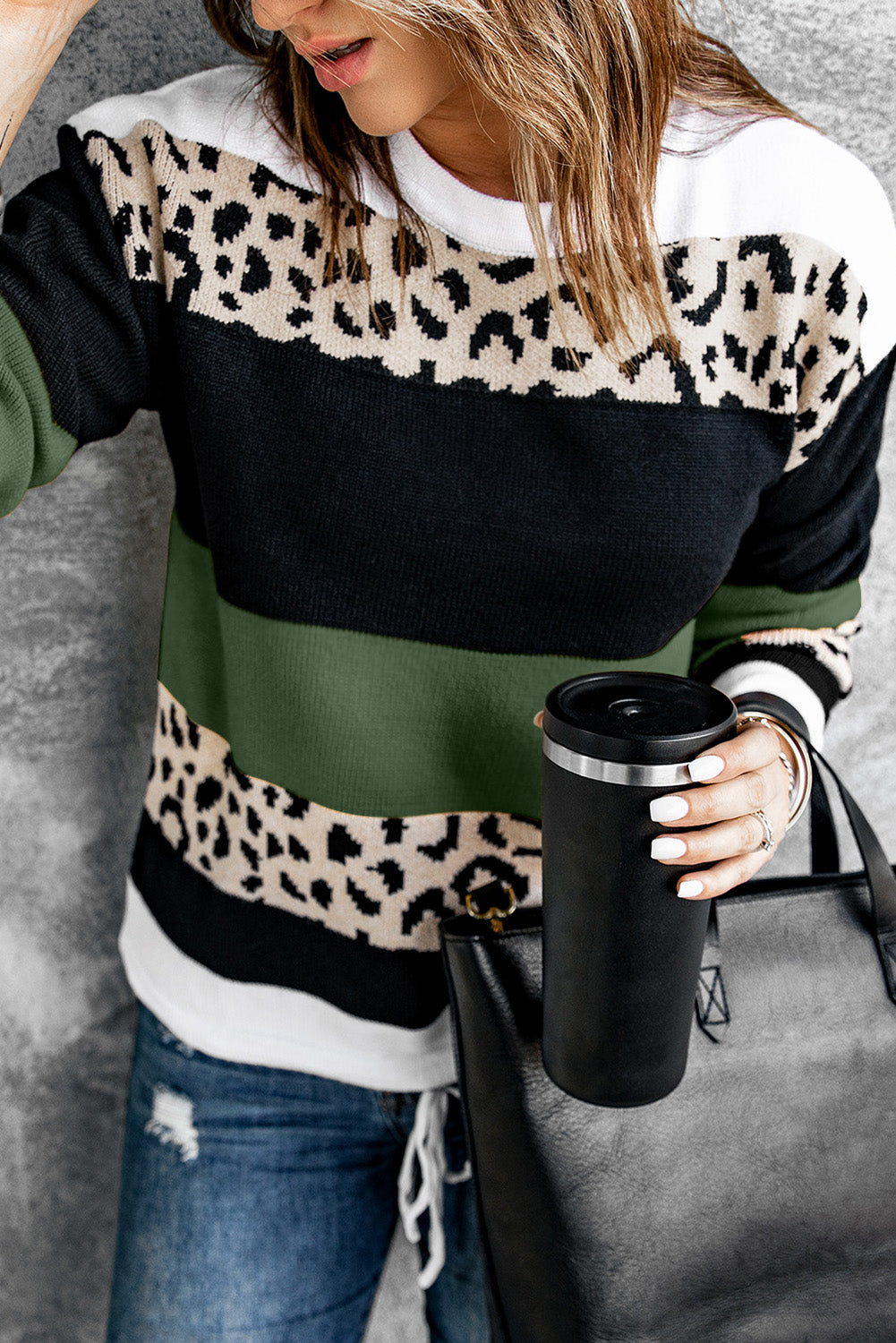 A stylish Crewneck Leopard Color Block Knit Pullover Sweater featuring a chic color block design and leopard pattern splicing, perfect for casual wear.