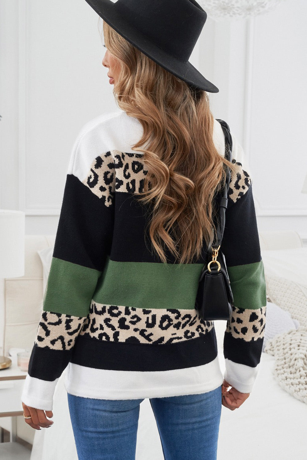 A stylish Crewneck Leopard Color Block Knit Pullover Sweater featuring a chic color block design and leopard pattern splicing, perfect for casual wear.