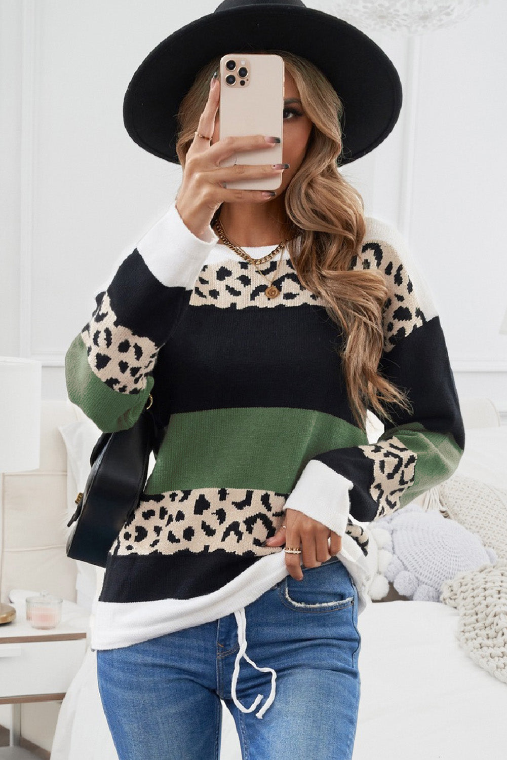 A stylish Crewneck Leopard Color Block Knit Pullover Sweater featuring a chic color block design and leopard pattern splicing, perfect for casual wear.