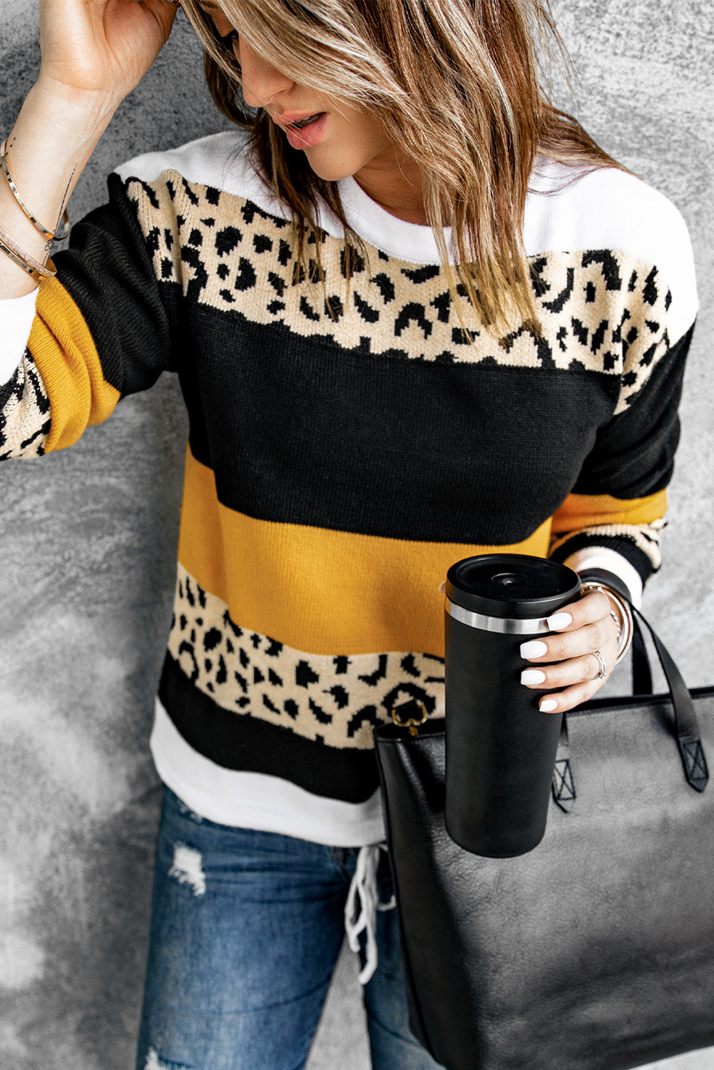 A stylish Crewneck Leopard Color Block Knit Pullover Sweater featuring a chic color block design and leopard pattern splicing, perfect for casual wear.