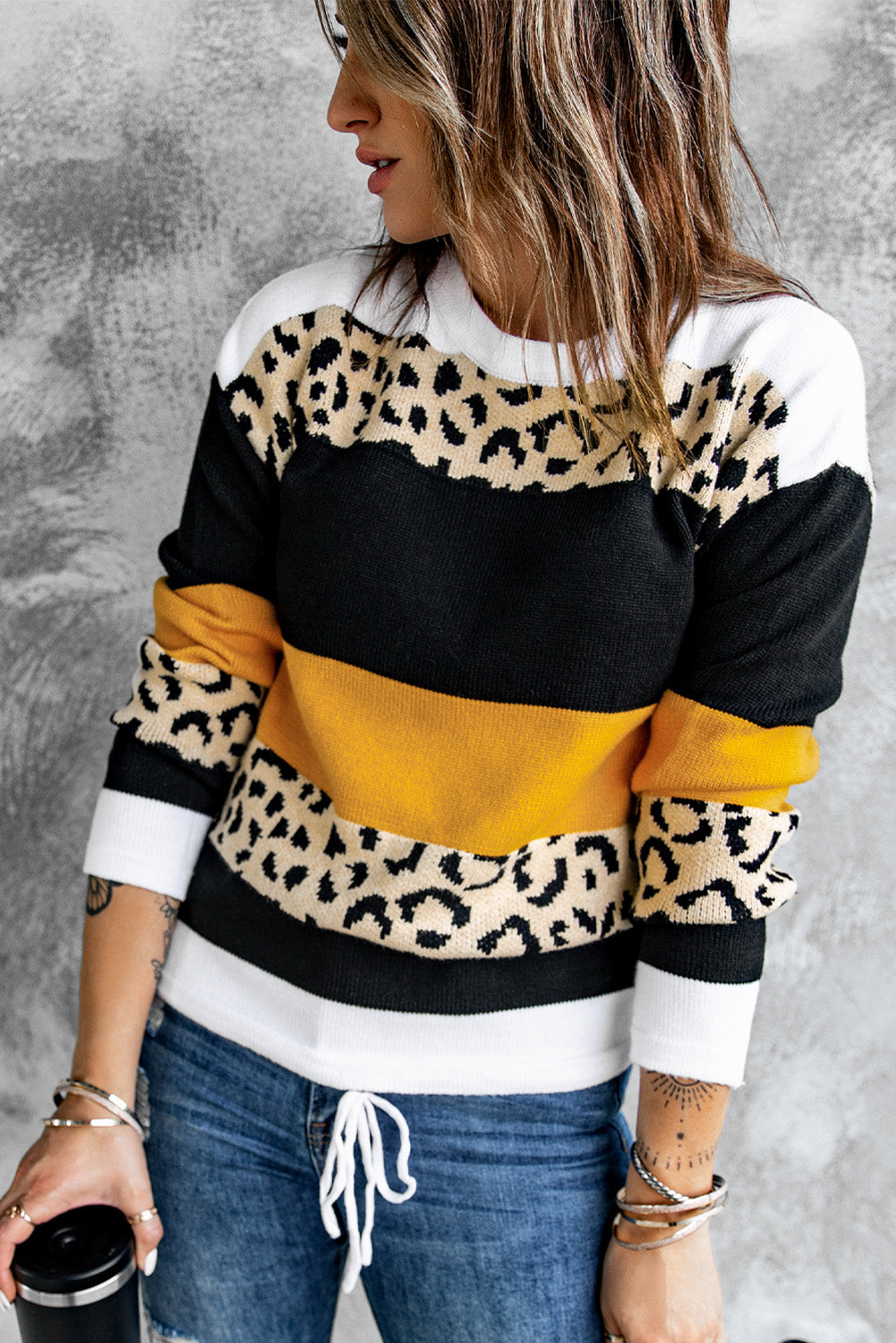 A stylish Crewneck Leopard Color Block Knit Pullover Sweater featuring a chic color block design and leopard pattern splicing, perfect for casual wear.