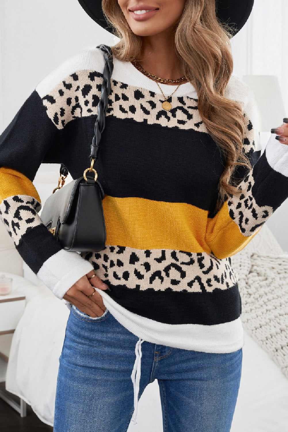 A stylish Crewneck Leopard Color Block Knit Pullover Sweater featuring a chic color block design and leopard pattern splicing, perfect for casual wear.