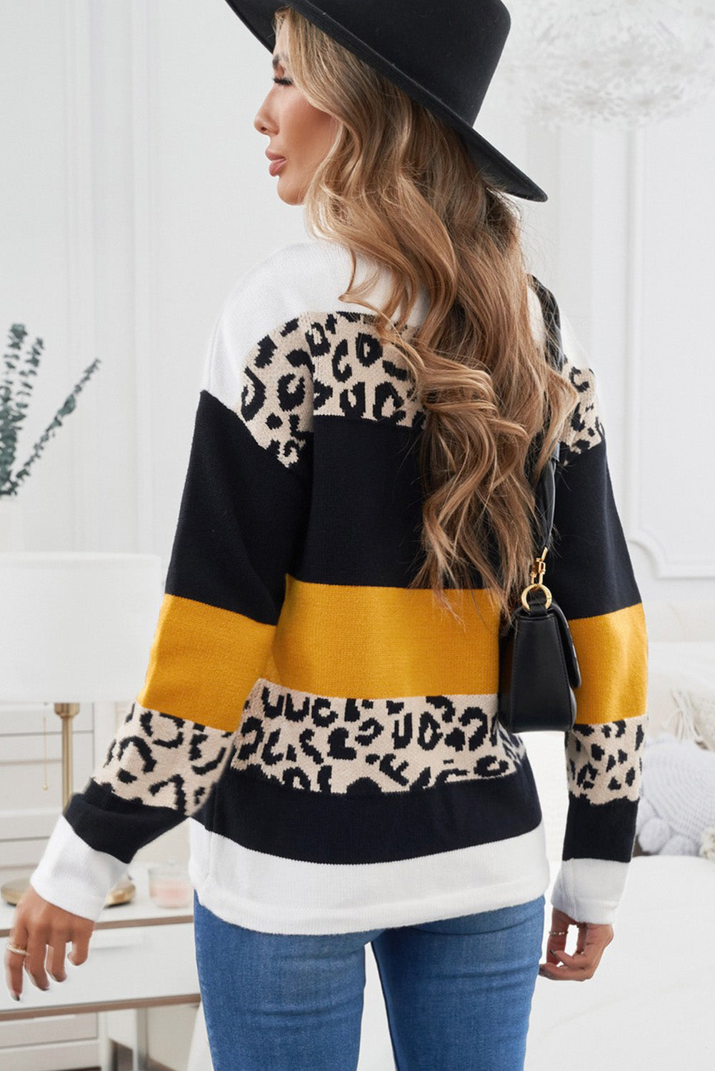 A stylish Crewneck Leopard Color Block Knit Pullover Sweater featuring a chic color block design and leopard pattern splicing, perfect for casual wear.