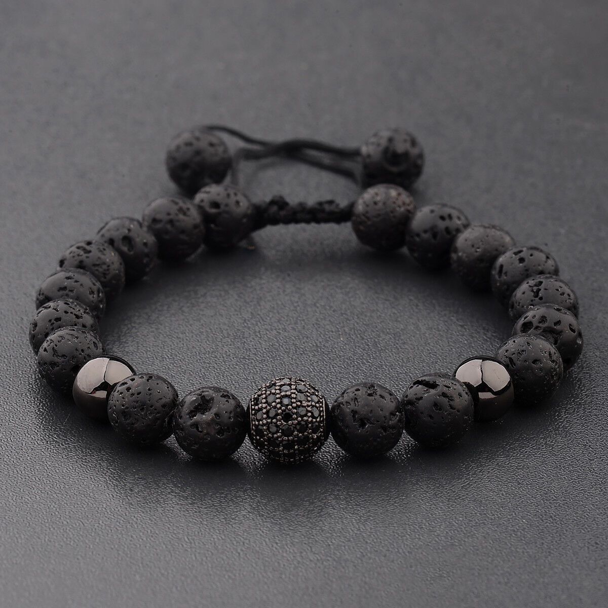 Crystal Ball Black Lava Stone Bracelet showcasing natural lava stones and elegant design, perfect for essential oil aromatherapy.