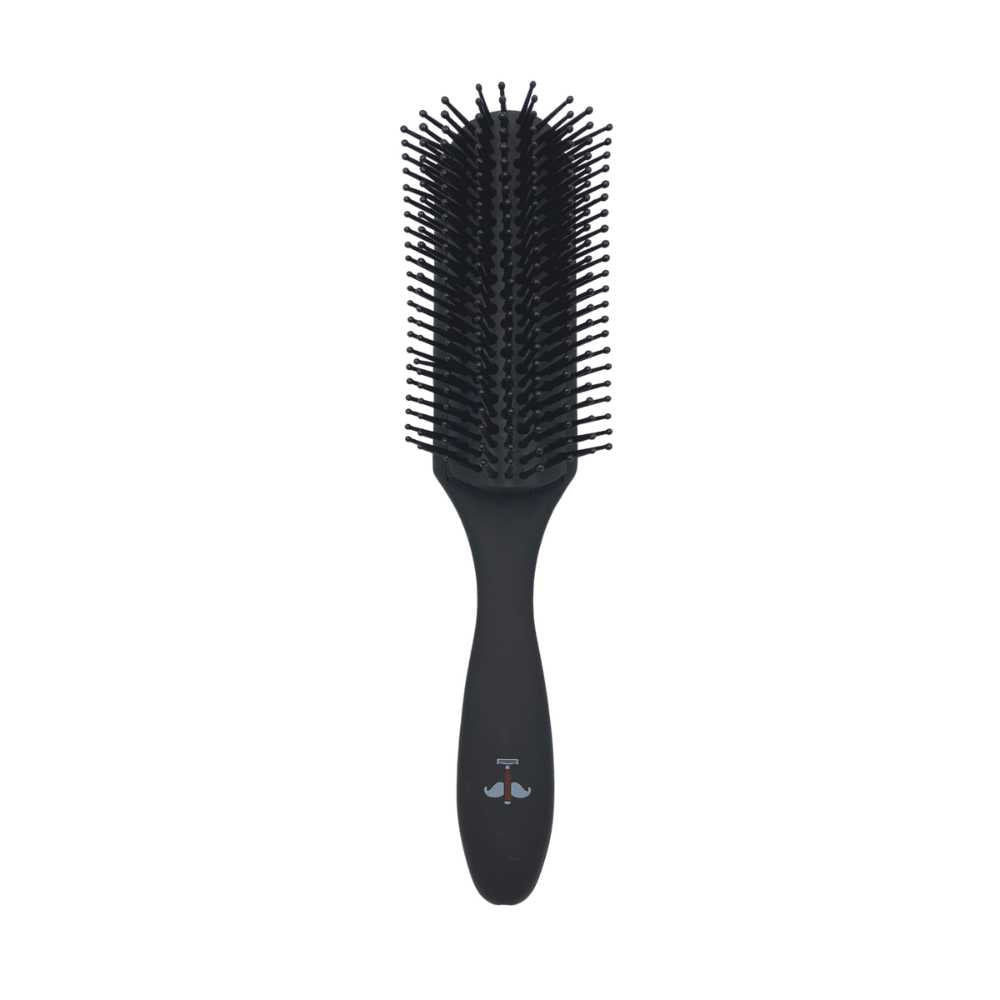 Shave Essentials Cushion Brush with ergonomic handle and nylon bristles, designed for effective hair styling.