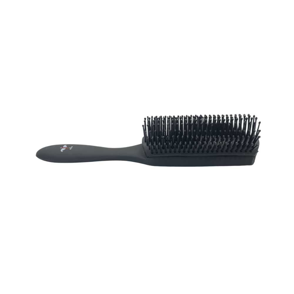 Shave Essentials Cushion Brush with ergonomic handle and nylon bristles, designed for effective hair styling.